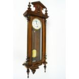 A Gustave Becker Vienna regulator, with enamel dial, signed, 122cm high,