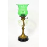 A glass and brass oil lamp,