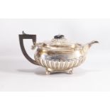 A silver teapot of Regency form,