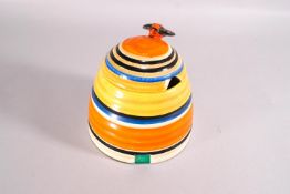 A Clarice Cliff 'Bizarre' honey pot, of reeded form, circa 1930, printed Newport pottery marks,