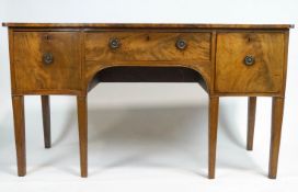 A Georgian mahogany serpentine sideboard, the top inlaid with satinwood and ebony stringing,