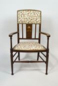 An Art Nouveau elbow chair, inlaid with mother of pearl, 89cm high,