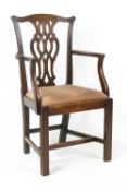 A George III mahogany elbow chair with pierced interlaced splats,