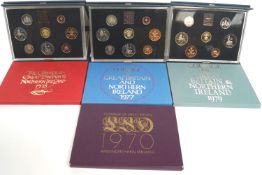A collection of seven proof coin sets, comprising : 1971, 1973, 1977, 1979, 1983, 1984, 1985,