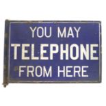 A metal and enamel telephone sign, of rectangular form,