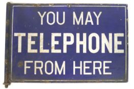 A metal and enamel telephone sign, of rectangular form,