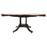 A 20th century mahogany Jupe style dining table,