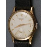 A 9ct gold cased Longines wristwatch. Analogue dial with baton markings and second hand dial.
