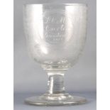 A mid 19th century wheel engraved glass presentation rummer,