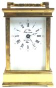 A French (Sainte Suzanne) brass eight day clock, with bevelled glass panelled top and sides,