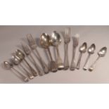 A group of assorted silver flatware, in the Hanoverian, Old English and Fiddle patterns,