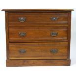 A late Victorian mahogany chest of three drawers with Art Nouveau style handles, on plinth base,