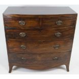 A 19th century mahogany bow front chest of two short and three long drawers on splayed bracket feet