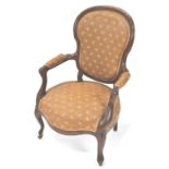 A Victorian mahogany show frame armchair with cartouche shaped back on cabriole legs