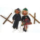 Two Pelham puppets, a Scotsman and a man in a suit,