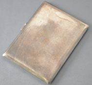 A plain rectangular form engine turned silver cigarette case with gilt interior, Garrard & Co,