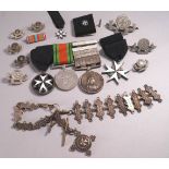 A medal group with the Defence medal, The Service medal of the Order of St John with six bars,