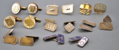 A collection of eight pairs of silver cufflinks of variable designs.
