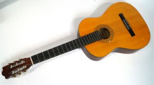 A Hohner acoustic guitar, model MC-05,