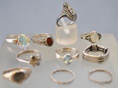 A collection of ten silver rings of variable designs. Ranging in size from H to O.