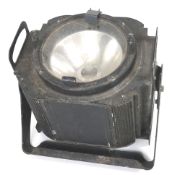 A large vintage theatre stage light, with mounting bracket and filter clips,