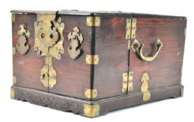 A brass bound Chinese hardwood travelling dressing table/box, of rectangular form,