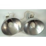 A pair of large industrial spotlights, by TRAC of Thirsk, with aluminium bowl shades,