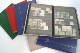 A collection of 20th century stamps in six albums