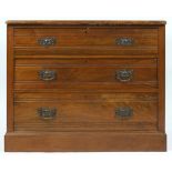 A late Victorian mahogany chest of three long drawers, on plinth base with later pine top,