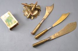 Three trench art brass letter openers and other items