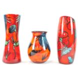 A Poole pottery flared form poppy pattern vase with slant cut top, 24cm high,