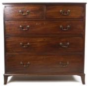 A George III mahogany chest of two short and three long drawers with brass swan neck handles