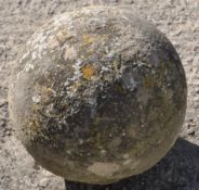 A Bath stone sphere, 99.