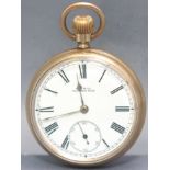 A gold-plated open faced Waltham pocket watch.