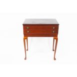 A mahogany two drawer canteen on cabriole legs,