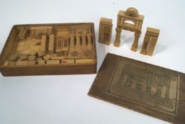 A boxed set of wooden Palace building bricks