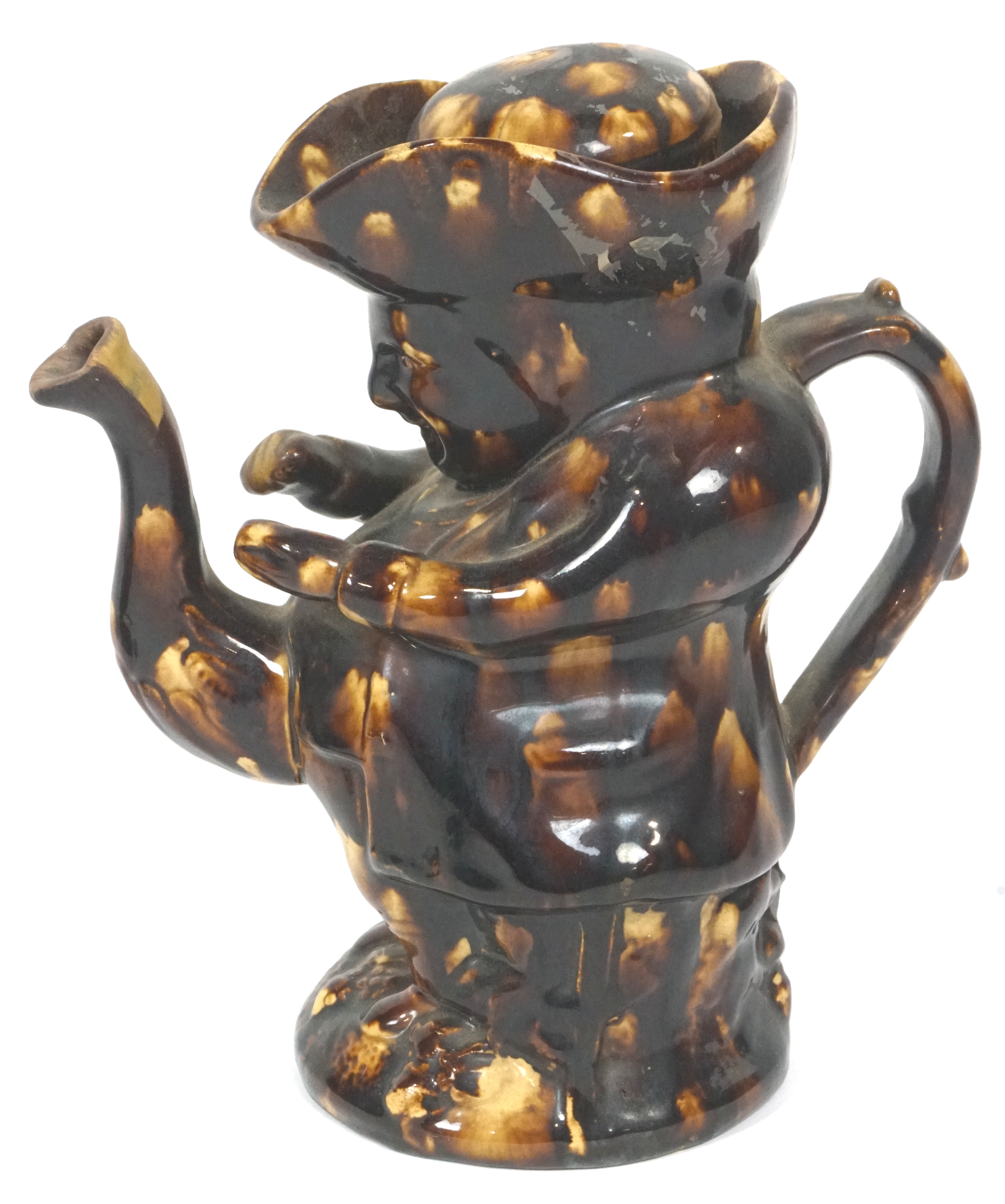 Two Staffordshire pottery treacle glazed Toby jugs and a teapot and cover, 19th century, - Image 2 of 4