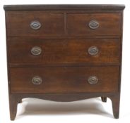 A 19th century oak chest of drawers, with two short drawers above two long graduated drawers,