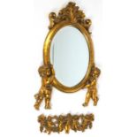A composition gilt mirror,