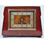 A German ? mahogany chiming clock, of Art Deco design, in a mahogany shaped rectangular case,