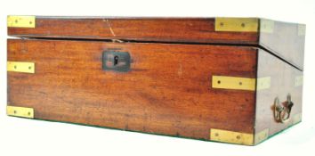 A 19th century mahogany and brass bound writing slope with brass handles, one opening a drawer,