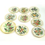 A group of ten Italian Faience fruit plates, in three sizes, decorated with assorted fruits,