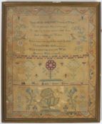 An 18th century sampler by Mary Bright, depicting verses, flowers, moths, birds and a dog,