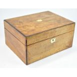 A ladies 19th century walnut dressing case, of plain rectangular form,