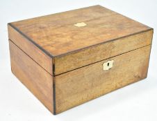 A ladies 19th century walnut dressing case, of plain rectangular form,