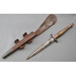 A WWII Second World War Fairbairn Sykes F-S 2nd Pattern commando fighting knife having a chequered
