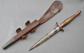 A WWII Second World War Fairbairn Sykes F-S 2nd Pattern commando fighting knife having a chequered