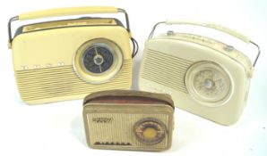 A Steepletone white radio, 26cm high x 31cm wide, together with a Bush radio,