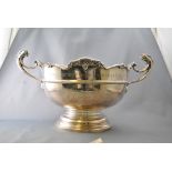 A silver two flying handled Monteith style trophy,