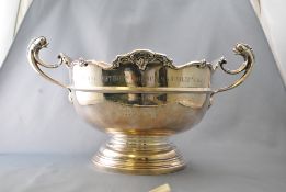 A silver two flying handled Monteith style trophy,